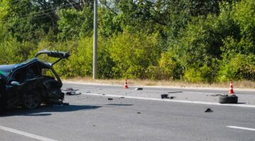 Debris in the road at the scene of a car accident | Colombo Law