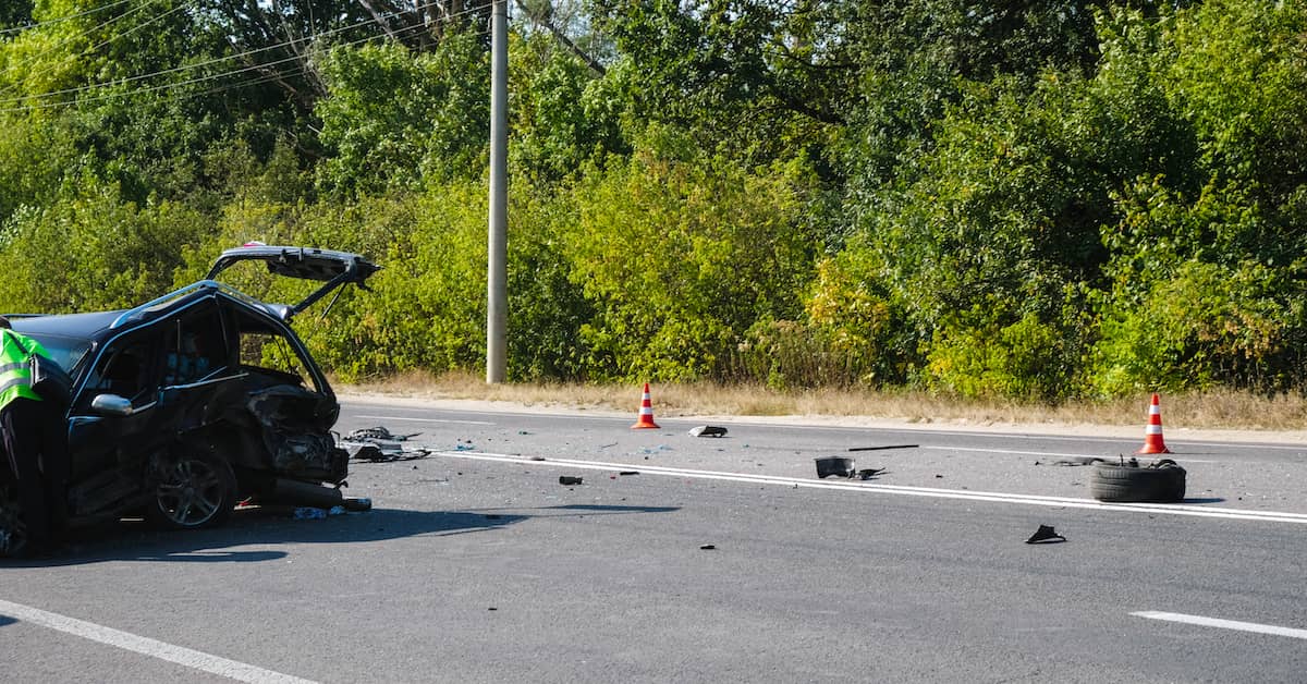 Debris in the road at the scene of a car accident | Colombo Law