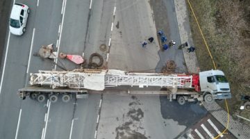 aerial view of overturned semi-truck on a highway