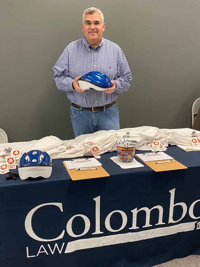 Colombo Law personal injury lawyers helmet truck