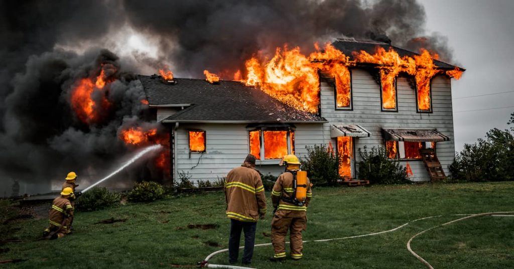 firefighters putting out a house fire