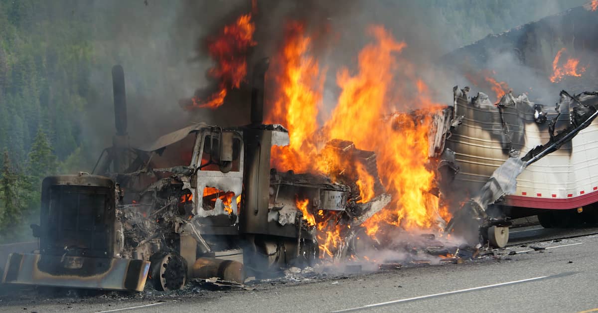 commercial truck on fire after a semi crash