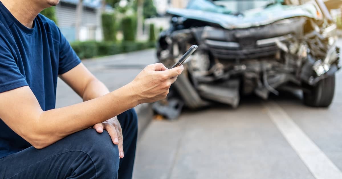 Man calling an attorney after a car accident | Colombo Law