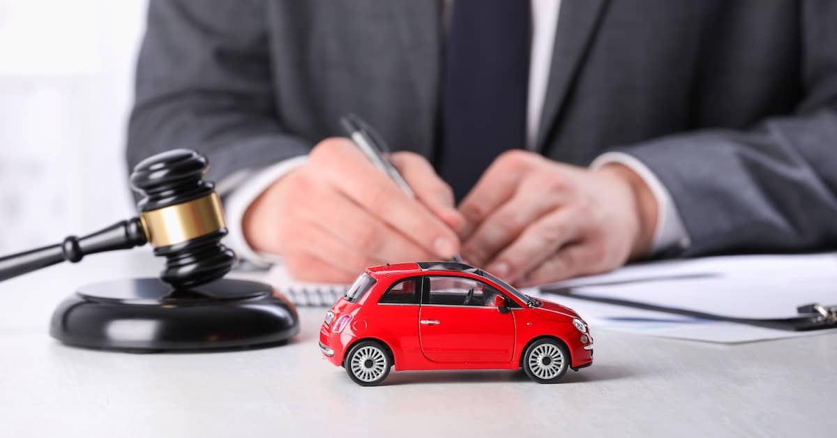 Car accident lawyer at his desk | Colombo Law