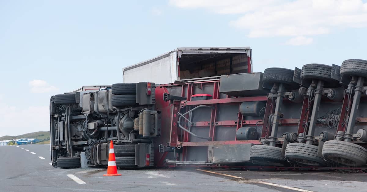 Scene of a truck accident on the side of the road | Colombo Law