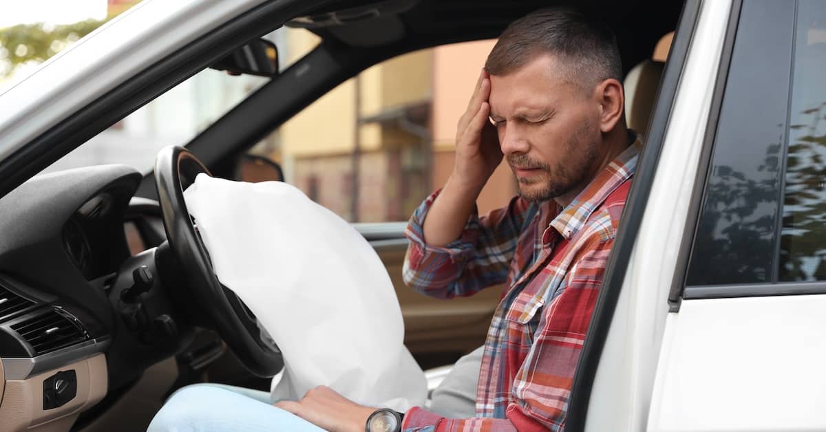 Man with a head injury after a car accident | Colombo Law